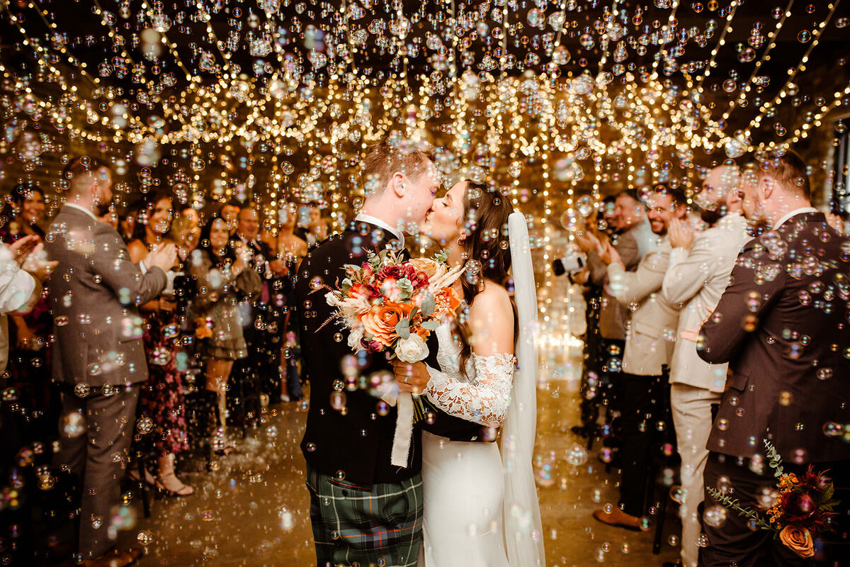 The Engine Works Wedding, Glasgow, Scotland, Bubble confetti kiss